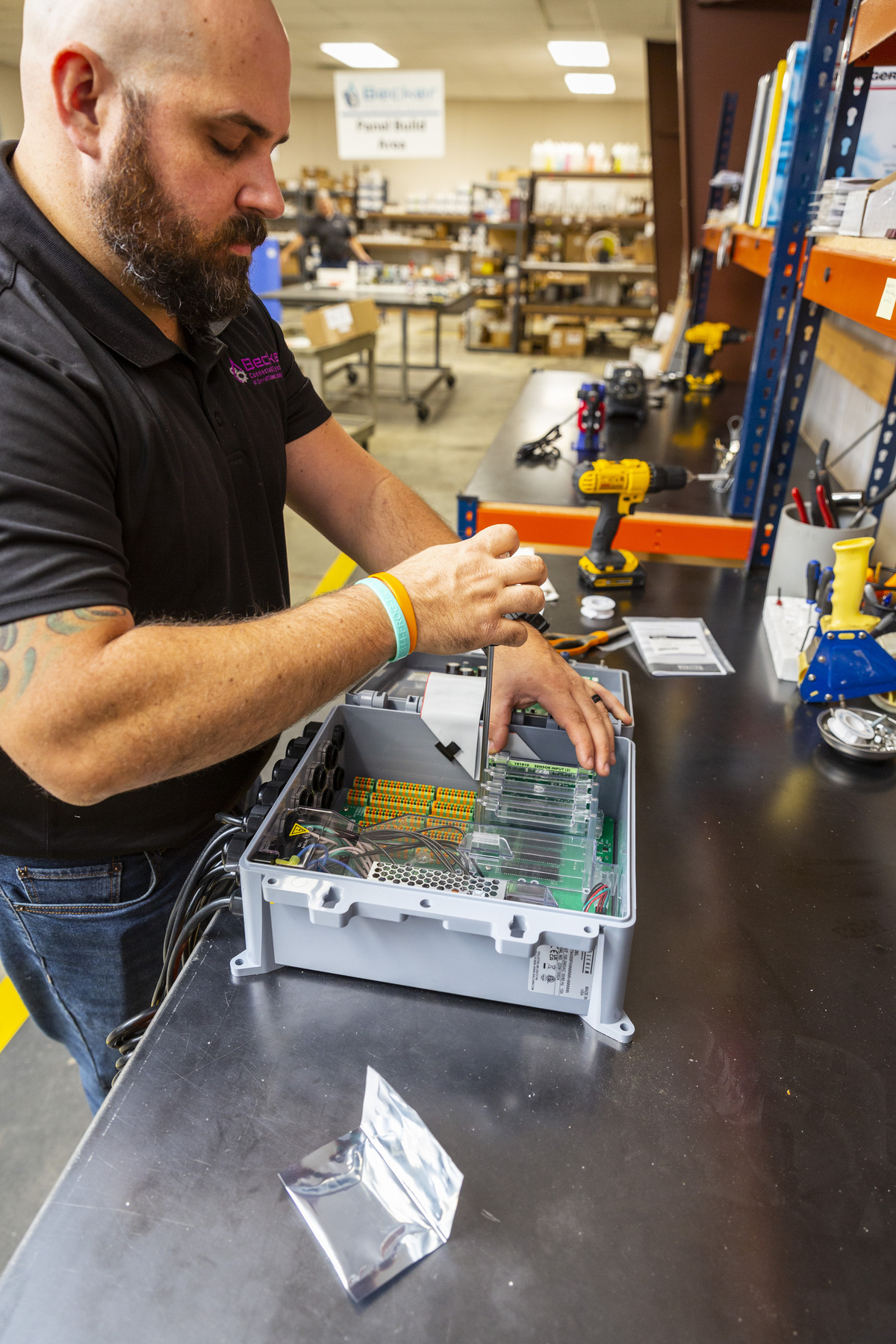 man working on motherboard